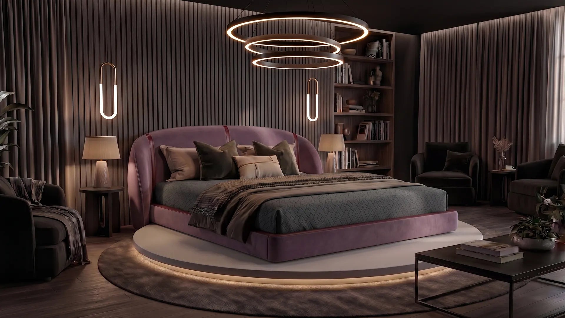 A velvet upholstered king bed on a lit circular platform, in a paneled bedroom